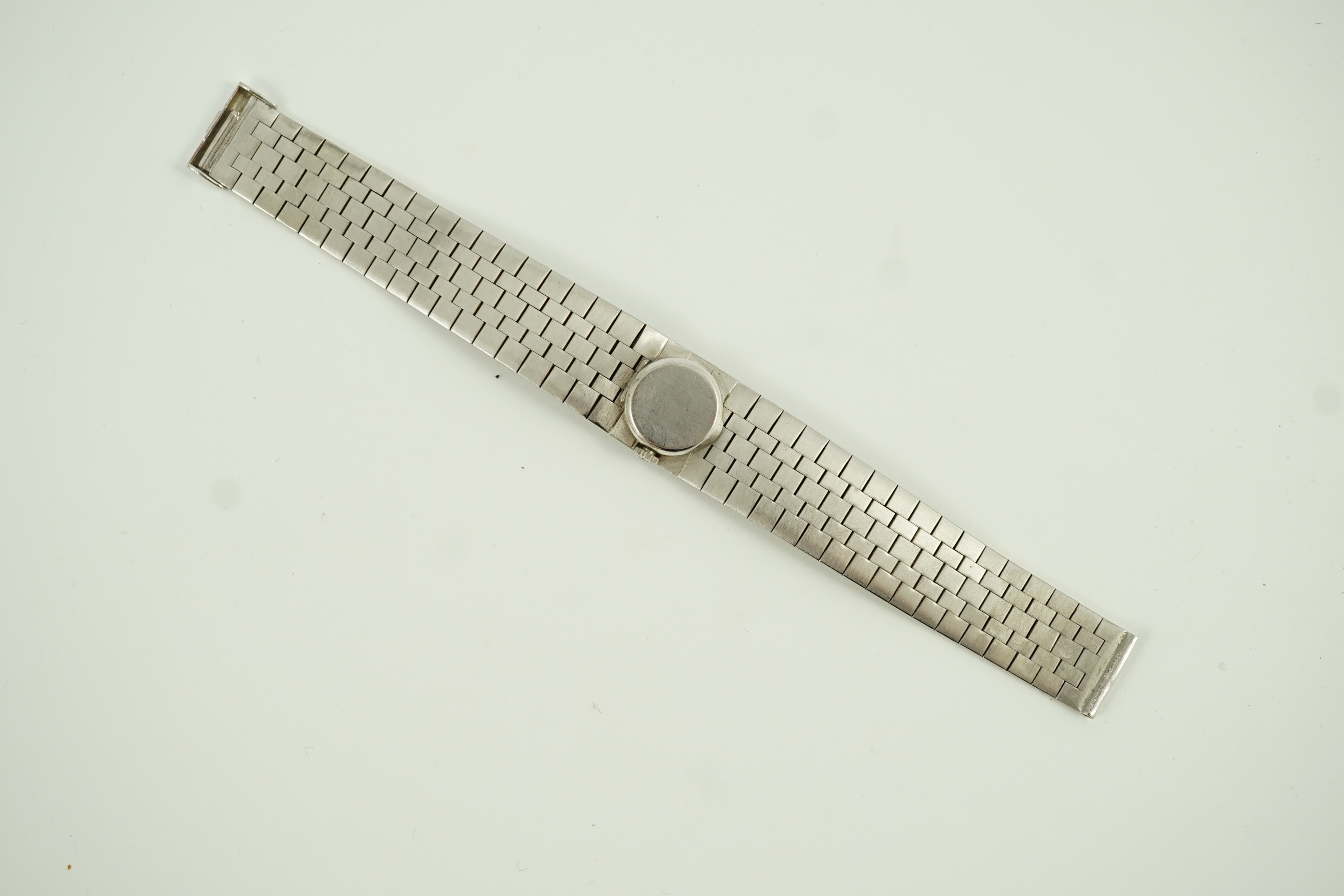 A lady's 1960's 18ct white gold and diamond set Vertex manual wind bracelet watch